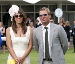 ‘Dutiful’ fiance Shane Warne joins Liz Hurley at breast cancer charity event