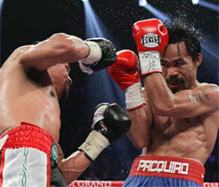 Pacquiao edges Marquez on tight decision