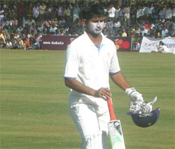 Karnataka enjoy run feast as UP fail to advance
