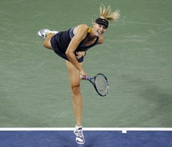 Sharapova shifts up a gear to reach third round