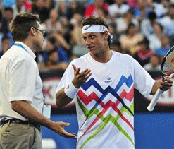 Nalbandian fined for throwing water at tournament staff