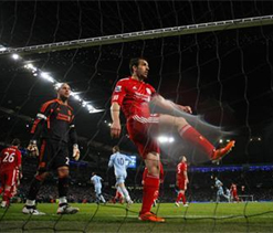 City move three points clear with Liverpool