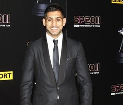 Amir Khan cries foul over ringside intervention during defeat
