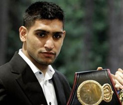 Khan eyeing Hatton ‘world title’ bout after Molina clash