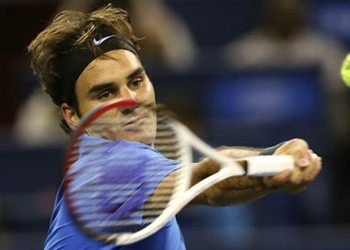 Ignoring death threats, Federer wins in Shanghai