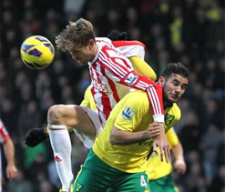 Johnson header moves Norwich above Stoke