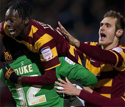 Bradford 1-1 Arsenal: Vermaelen miss sends Gunners crashing out