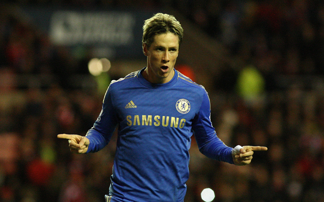Torres fires twice to give Benitez first league win