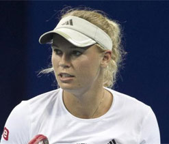Wozniacki fires coach after losing top spot