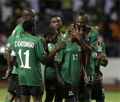 Memory of dead players steers Zambia to victory	