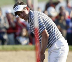 Donald stays solid in strong winds to open 2012 season 