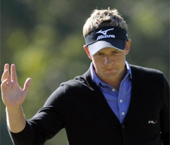 Top seed Donald exits, Tiger scrapes through