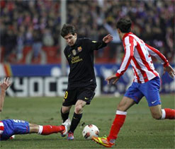 Messi gives Barcelona 2-1 win at Atletico Madrid