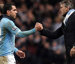 Mancini reopens City door for outcast Tevez