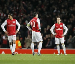 Milan survive Arsenal onslaught to progress