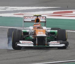 Force India team car delayed by firebomb in Manama