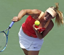 Sharapova books last eight spot after Cornet retires