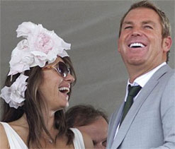Warnie ` happy for the first time in life` with Liz Hurley