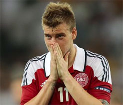Euro 2012: Denmark`s Bendtner fined and banned for ambush marketing