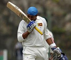 Dilshan, Sangakkara tons put Sri Lanka on top