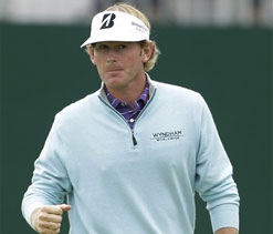 Snedeker builds 1-shot lead, with Tiger lurking