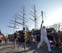Sun comes out as Olympic torch tours London