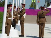 British soldiers raise the Brazilian flag during the Flag Raising ceremony at the Olympic Village in London.