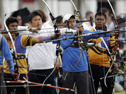 Archers from Malaysia, South Korea and Taiwan compete in the individual ranking round at the 2012 Summer Olympics in London.