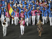 Germany`s Natascha Keller carries the flag during the Opening Ceremony at the 2012 Summer Olympics in London.