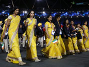 Sania Mirza of India, second from left, parades with fellow athletes during the Opening Ceremony at the 2012 Summer Olympics in London.