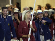 Russia`s Maria Sharapova carries the flag during the Opening Ceremony at the 2012 Summer Olympics in London.