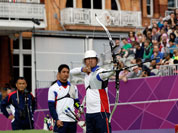Japan`s Takahuru Furukawa aims for the target during the team elimination stage at the 2012 Summer Olympics in London.