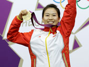 China`s Yi Siling celebrates after winning the gold medal in the women`s 10-meter air rifle event at the 2012 Summer Olympics in London.