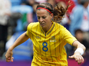 Sweden`s Lotta Schelin, left, battles for the ball against Japan`s Homare Sawa, right, during the group F women`s soccer match between Japan and Sweden at the London 2012 Summer Olympics.