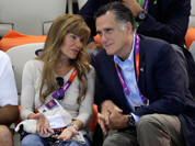US Republican presidential candidate Mitt Romney, right watches the opening day of swimming competitions at the Aquatics Centre in the Olympic Park during the 2012 Summer Olympics in London.