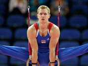 Czech gymnast Martin Konecny performs on the rings during the Artistic Gymnastic men`s qualification at the 2012 Summer Olympics.