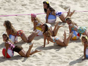 Dancers perform at the Beach Volleyball Venue at the 2012 Summer Olympics in London.