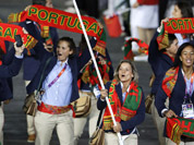 Portugal`s Telma Monteiro carries the flag during the Opening Ceremony at the 2012 Summer Olympics in London.