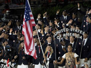 Fencer Mariel Zagunis leads Team USA into the stadium during the Opening Ceremony for the 2012 Olympic Summer Games in London.