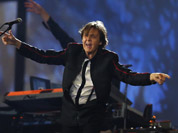 Paul McCartney performs during the Opening Ceremony at the 2012 Summer Olympics in London.