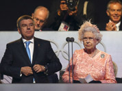 Britain`s Queen Elizabeth II, declares the games open alongside International Olympic Committee Vice President Thomas Bach during the Opening Ceremony at the 2012 Summer Olympics in London.