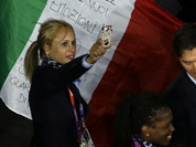 The Italian team parade during the Opening Ceremony at the 2012 Summer Olympics in London.
