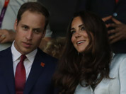 Britain`s Catherine, Duchess of Cambridge, and Britain`s Prince William, the Duke of Cambridge attend the Opening Ceremony at the 2012 Summer Olympics in London. 