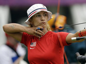 United State`s Khatuna Lorig releases her arrow during an individual ranking round at the 2012 Summer Olympics in London.
