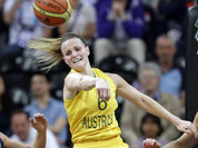 Australia`s Jennifer Screen (6) passes the ball past Great Britain`s Johannah Leedham (13)during the first half of a preliminary women`s basketball game at the 2012 Summer Olympics in London.