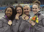 Members of the US women`s relay team, from left, Lia Neal, Allison Schmitt, Jessica Hardy and Missy Franklin pose with their bronze medals in the women`s 4x100-meter freestyle relay swimming final at the Aquatics Centre in the Olympic Park during the 2012 Summer Olympics in London.