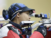 Malaysian shooter Nur Suryani Mohamed Taibi, who is eight months pregnant, competes in the qualifiers for the women`s 10-meter air rifle event, at the 2012 Summer Olympics in London.