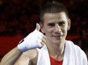 Serbia`s Aleksandar Drenovak reacts after a middle weight 75-kg preliminary boxing match against Ecuador`s Mario Delgado Suarez at the 2012 Summer Olympics in London.