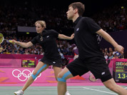 Germany`s Birgit Michels, left, and Michael Fuchs play against Chris Adcock and Imogen Bankier of Great Britain during a mixed doubles badminton match at the 2012 Summer Olympics in London. 