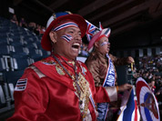 Thailand`s supporters cheer for their team during a mixed doubles badminton match of the 2012 Summer Olympics in London.